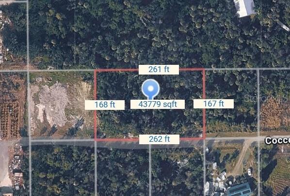An aerial map view shows a rectangular plot of land with its dimensions and square footage — 7224 COCCOLOBA WAY, BOKEELIA, FL