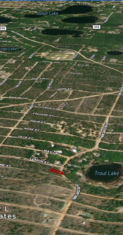 An aerial map view shows a highlighted plot of land near Trout Lake — LOT 23 TWIN LAKES BOULEVARD, INTERLACHEN, FL