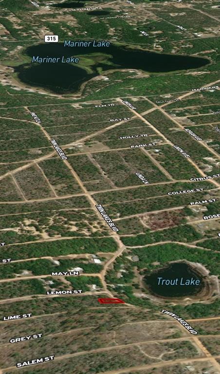 An aerial map view shows a highlighted property lot located near Trout Lake — LOT 23 TWIN LAKES BOULEVARD, INTERLACHEN, FL