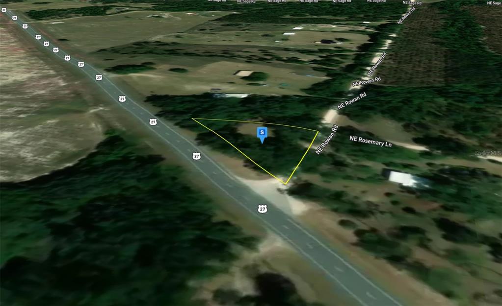 This is an aerial map view of a triangular plot of land near a highway — 4145 E US HWY 27, MAYO, FL