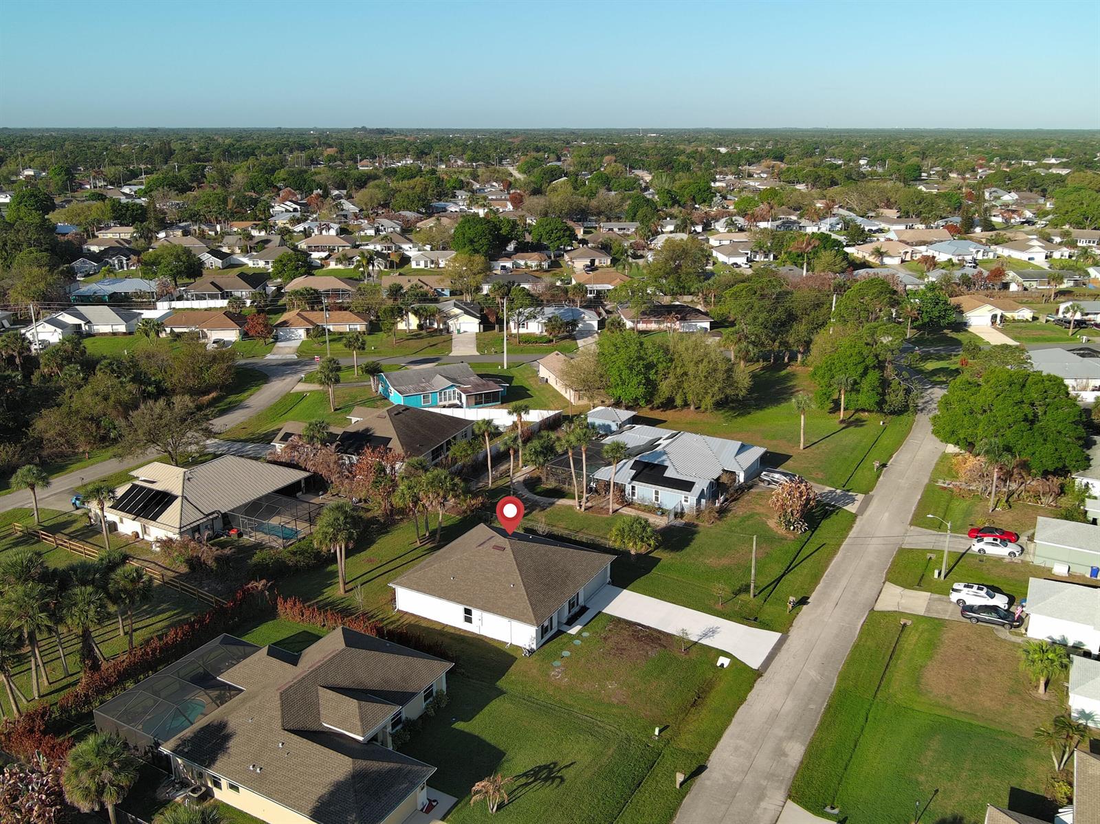 An aerial view shows a residential neighborhood with a single-story house marked by a pin — 450 Kendall Avenue, Sebastian FL 32958, SEBASTIAN, FL