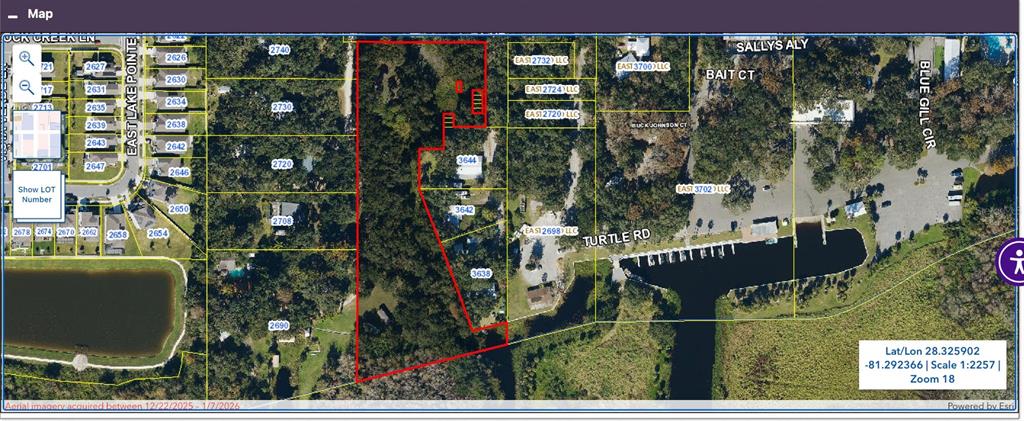 This is a map showing a property parcel outlined in red near a waterway — 0 SHARPEY ROAD, KISSIMMEE, FL