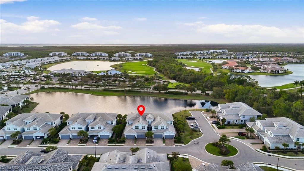 An aerial view shows a multi-unit residential building with a red location pin — 14655 SYCAMORE COURT UNIT 3121, PUNTA GORDA, FL