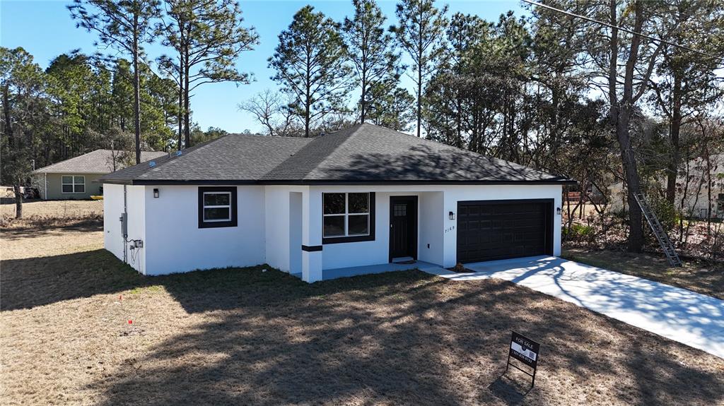 7169 N TALLWOOD DRIVE