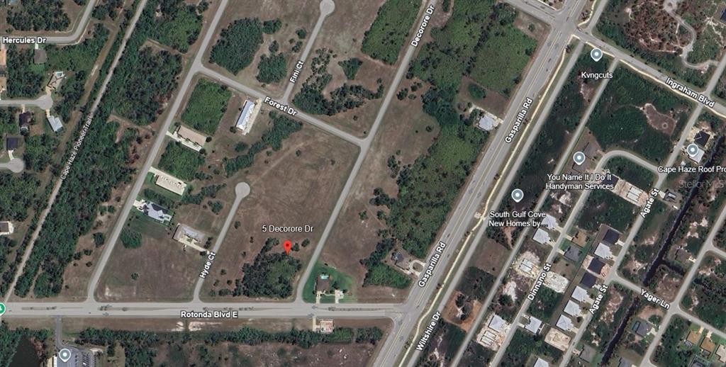 This is a satellite map view showing a vacant residential lot and surrounding streets — 5 DECORORE DRIVE UNIT 2, ROTONDA WEST, FL