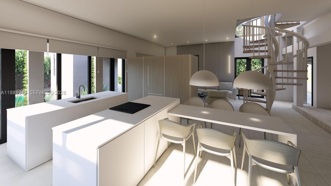 This architectural rendering shows a modern kitchen with a white island and spiral staircase — 402 SE 3rd St, Dania Beach FL 33004, DANIA BEACH, FL