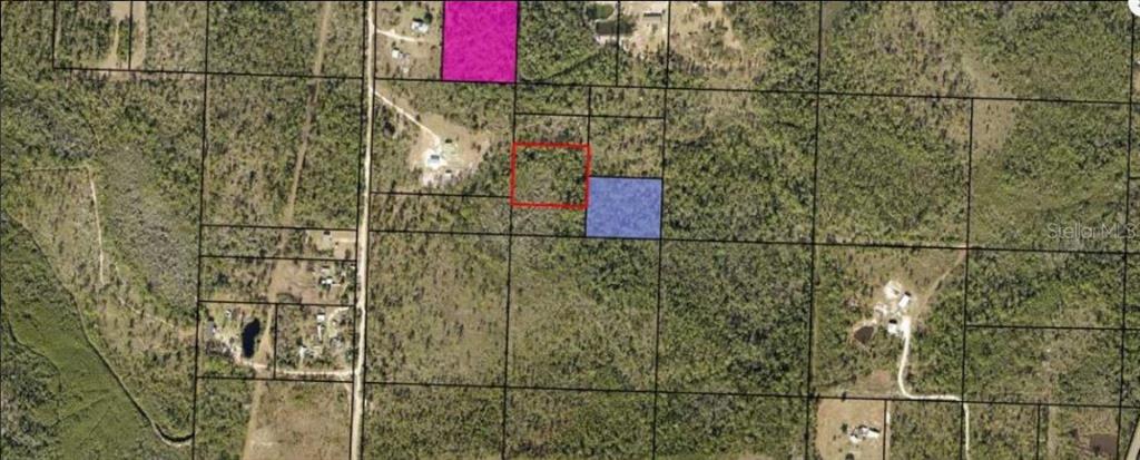 An aerial map shows several parcels of land with three specific lots highlighted in color — N/A, FOUNTAIN, FL