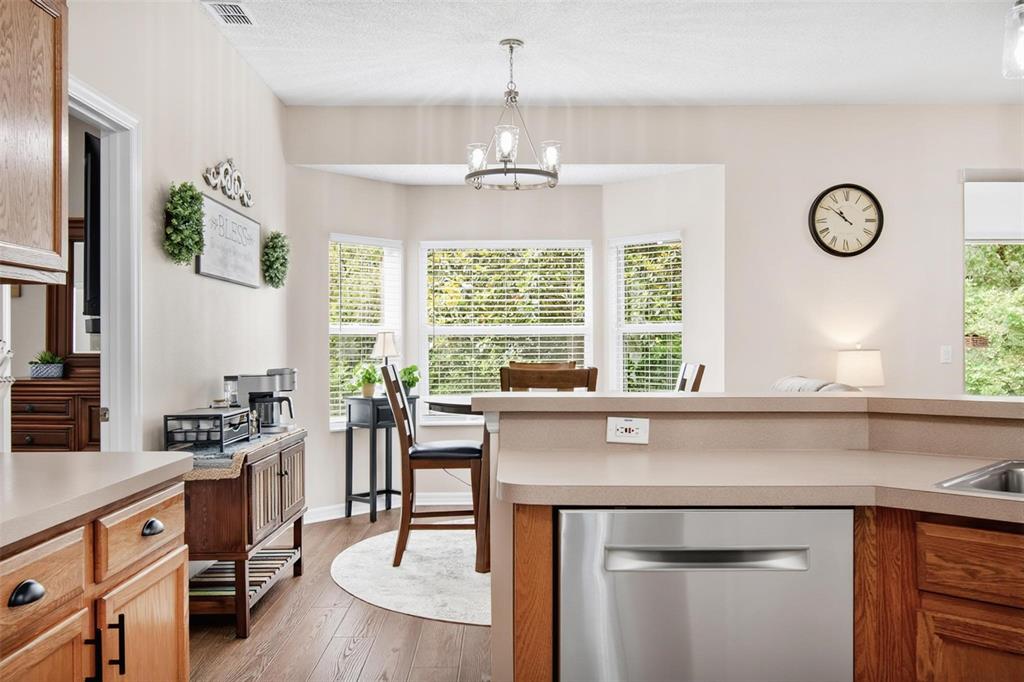 A gray single-story house with a two-car garage, arched entryway, and a manicured front lawn — 29 ETHAN ALLEN DRIVE, PALM COAST, FL