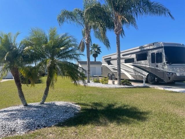 1064 CARAVAN LOOP, POLK CITY, FL — photo 2 of 10