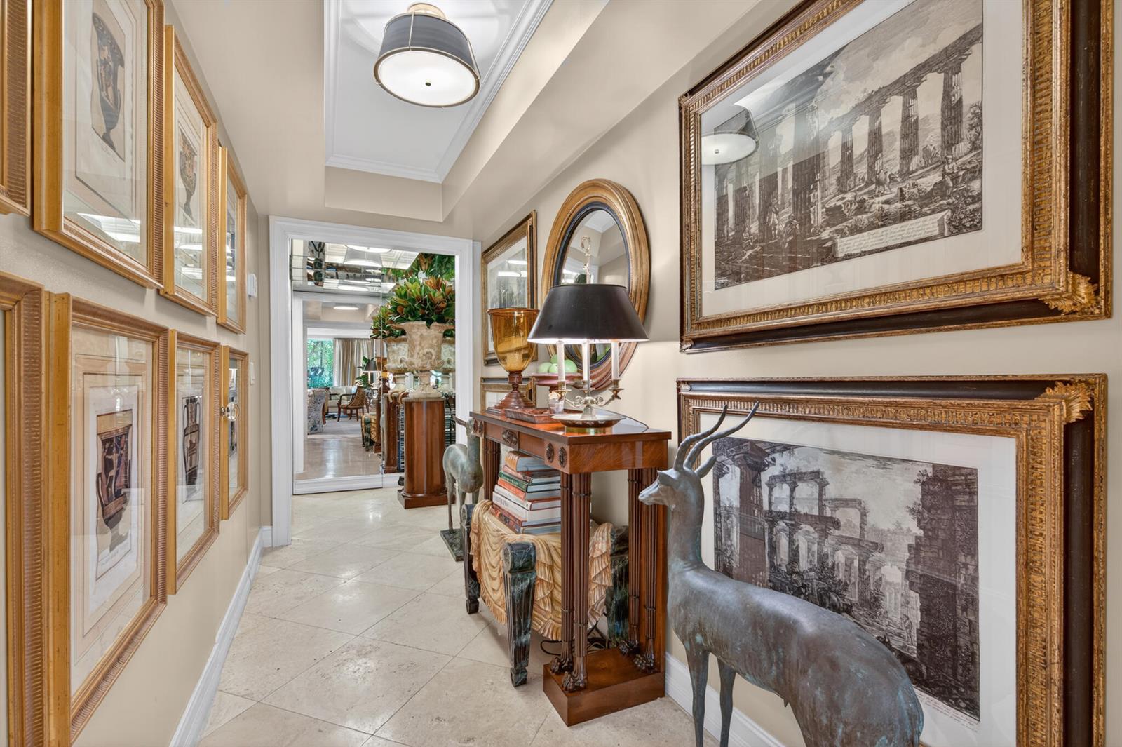 A dining room features green floral wallpaper, a round wooden table, and a lantern chandelier — 434 Chilean Avenue # 2b, Palm Beach FL 33480, PALM BEACH, FL