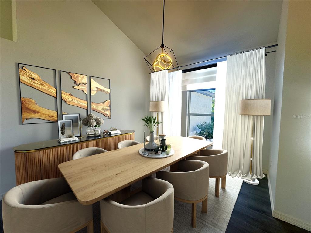 This dining room features a wooden table, upholstered chairs, a sideboard, and a modern pendant light — 215 HOLLOWBROOK CIRCLE, DAYTONA BEACH, FL