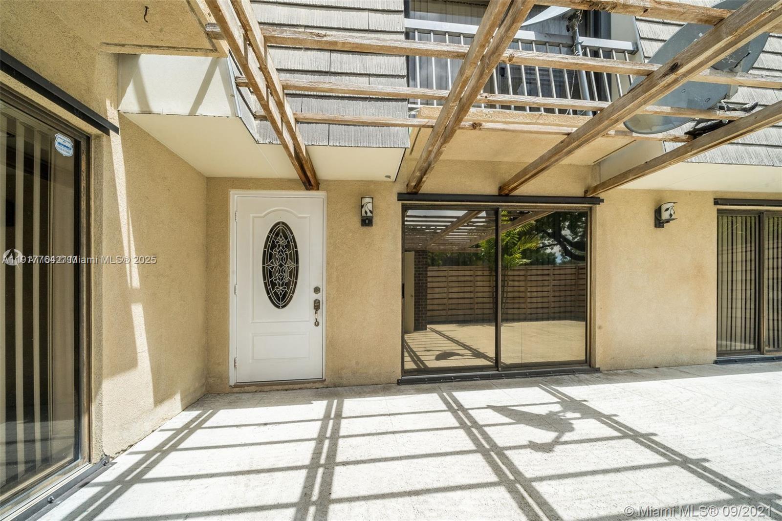 Front Door within Patio — PALM BEACH GARDENS, FL