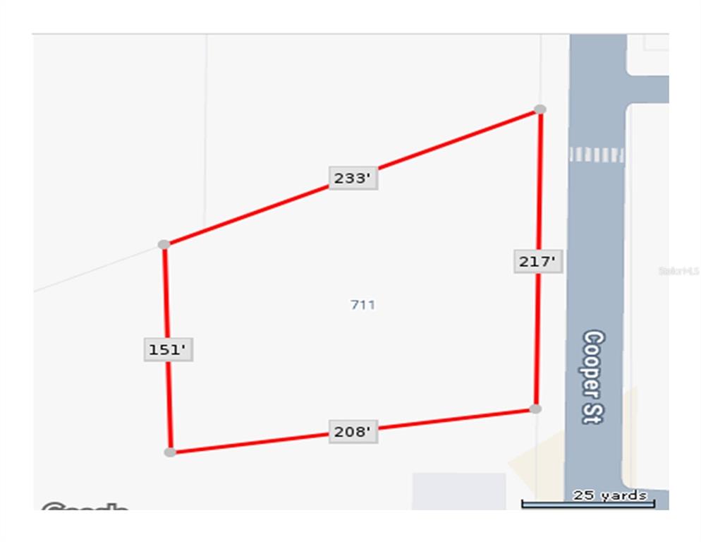 This is a map showing the property boundaries and dimensions of a land parcel — 711 COOPER STREET, PUNTA GORDA, FL