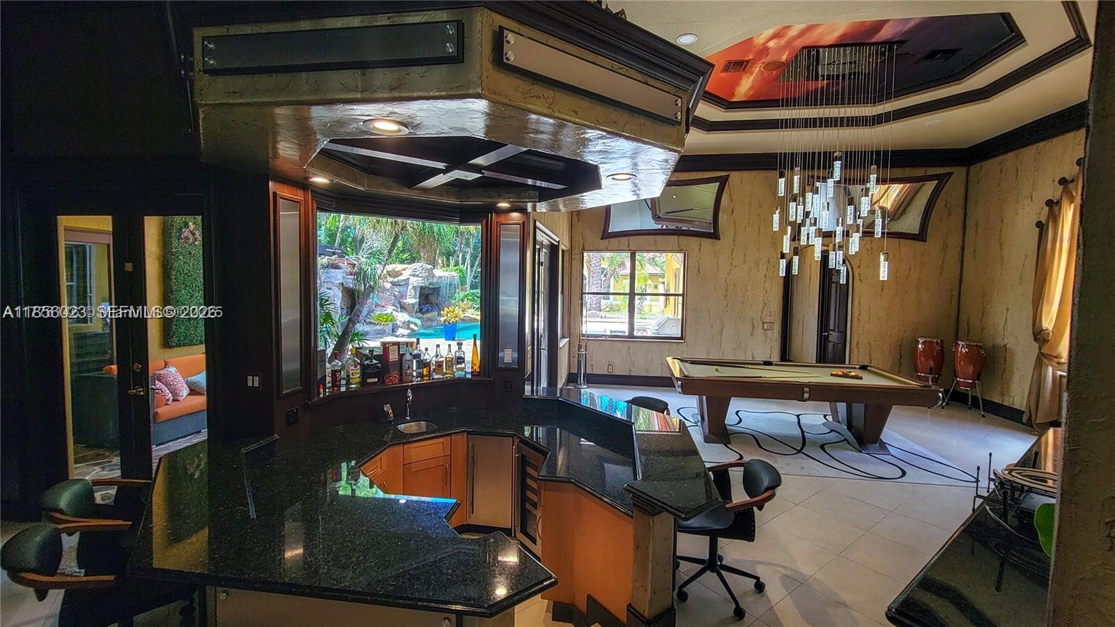 A game room features a wet bar, pool table, and a ceiling mural — 14503 SW 16th St, Davie FL 33325, DAVIE, FL