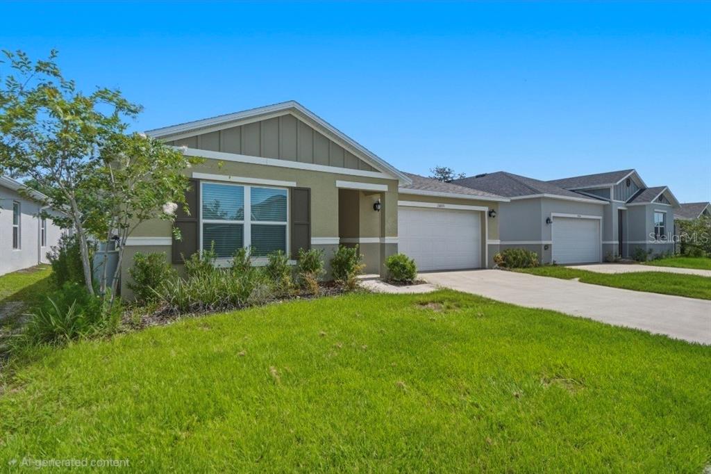 A single-story suburban house with a green exterior, a two-car garage, and a front lawn — 13085 THATCH PALM WAY, ORLANDO, FL