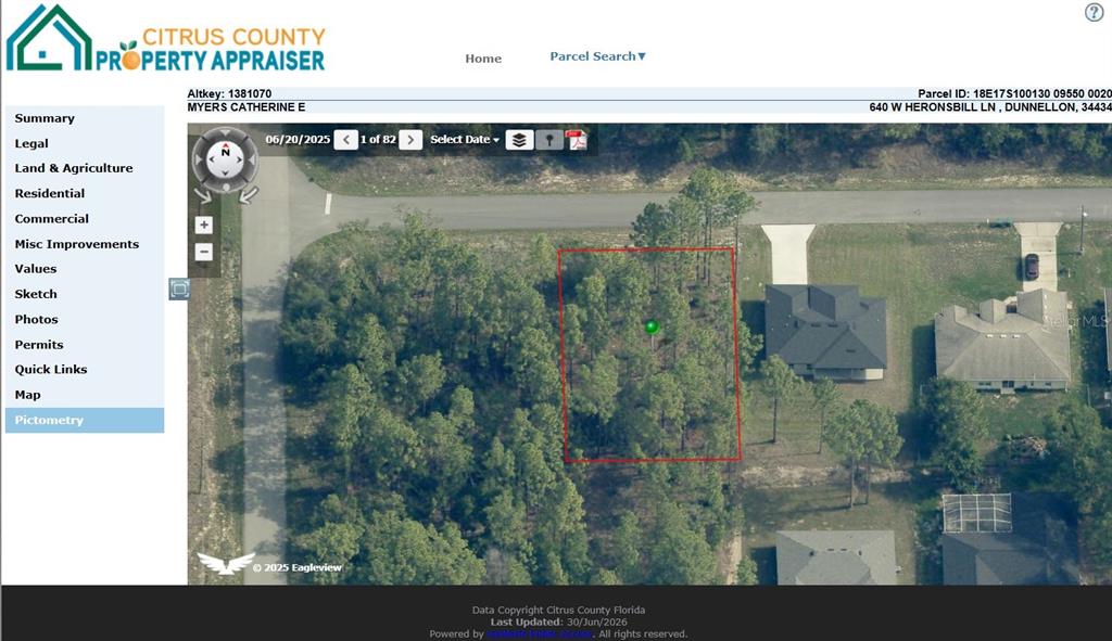 An aerial map view shows a wooded, undeveloped residential lot outlined in red — 640 W HERONSBILL LANE, DUNNELLON, FL