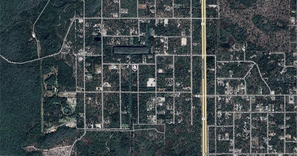 This is an aerial map view of a residential area with a highlighted property lot — 0 QUINTON ROAD, BROOKSVILLE, FL