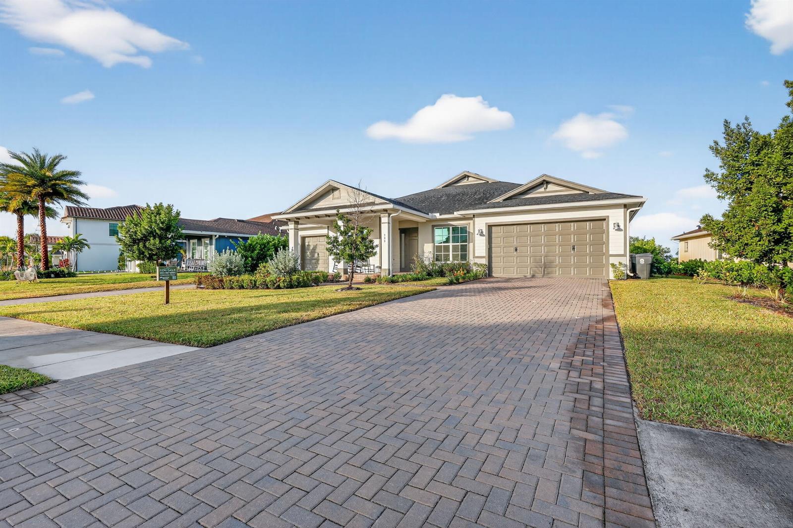 A single-story house with a brick paver driveway and a two-car garage — 799 Hookline Circle, Loxahatchee FL 33470, LOXAHATCHEE, FL