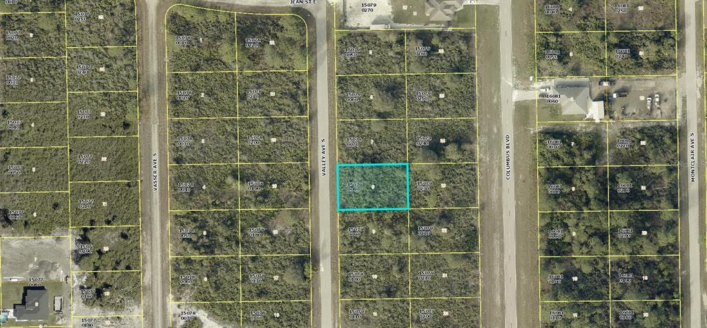 This is an aerial map showing a highlighted vacant lot located between two paved roads — 645 VALLEY AVENUE S, LEHIGH ACRES, FL