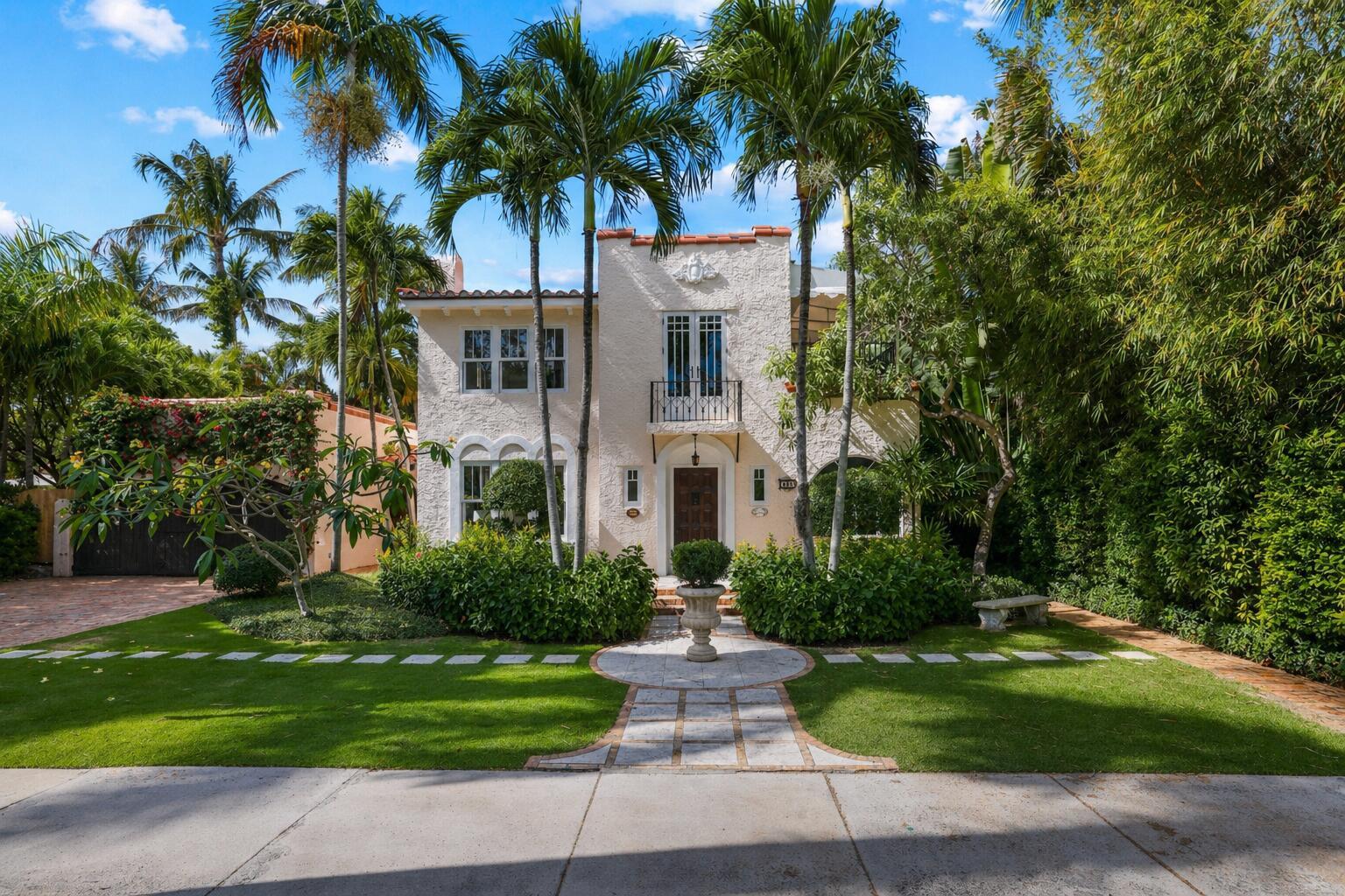 A two-story Mediterranean-style house with a stucco exterior, a balcony, and palm trees — 429 30th Street, West Palm Beach FL 33407, WEST PALM BEACH, FL