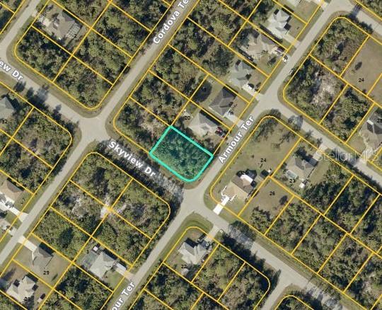 This is an aerial map view showing a vacant, wooded residential lot outlined in teal — LOT 21 ARMOUR TERRACE, NORTH PORT, FL