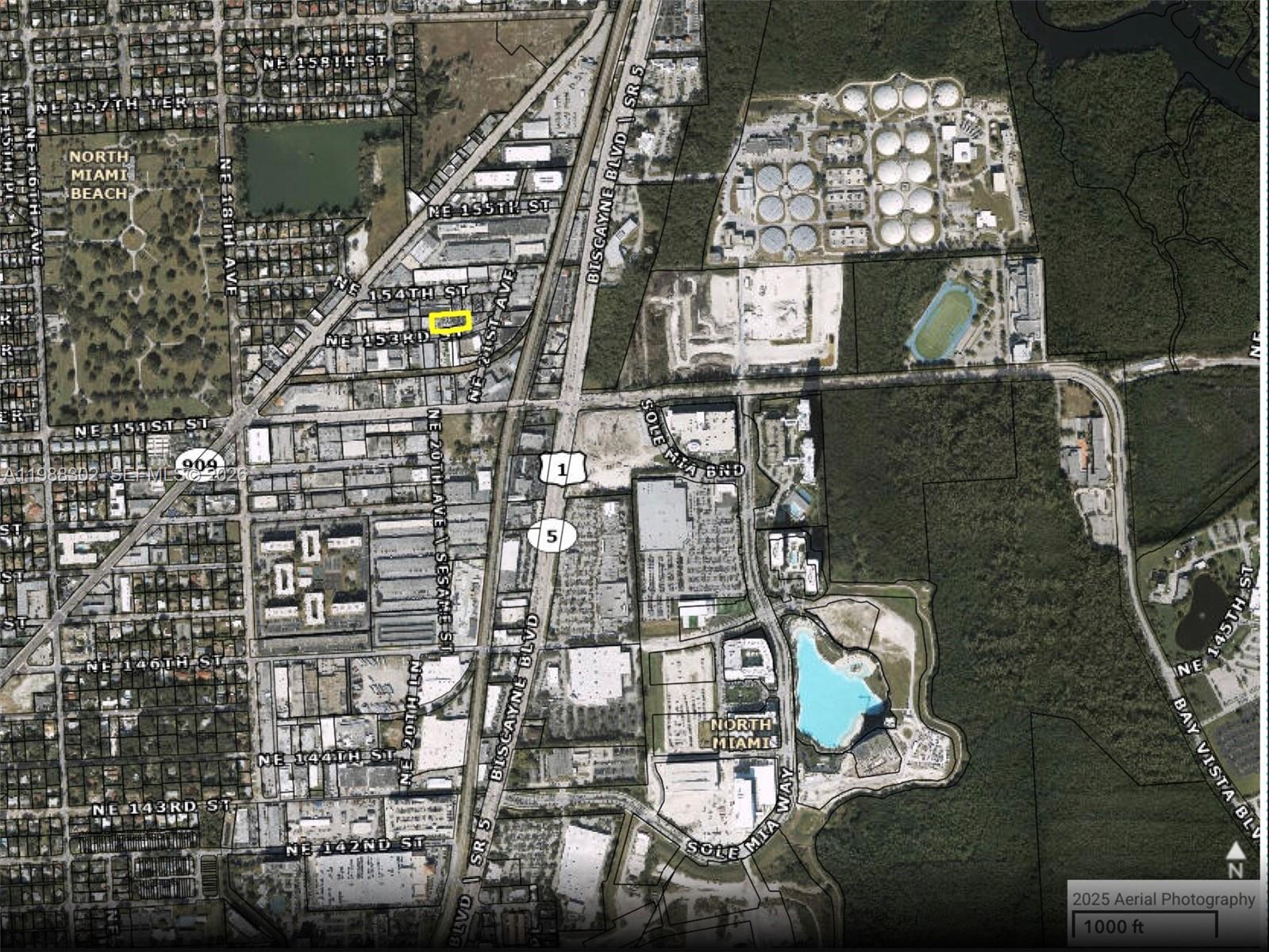 This is an aerial map showing a highlighted property in a North Miami industrial area — 1981 NE 153rd St, North Miami Beach FL 33162, NORTH MIAMI BEACH, FL