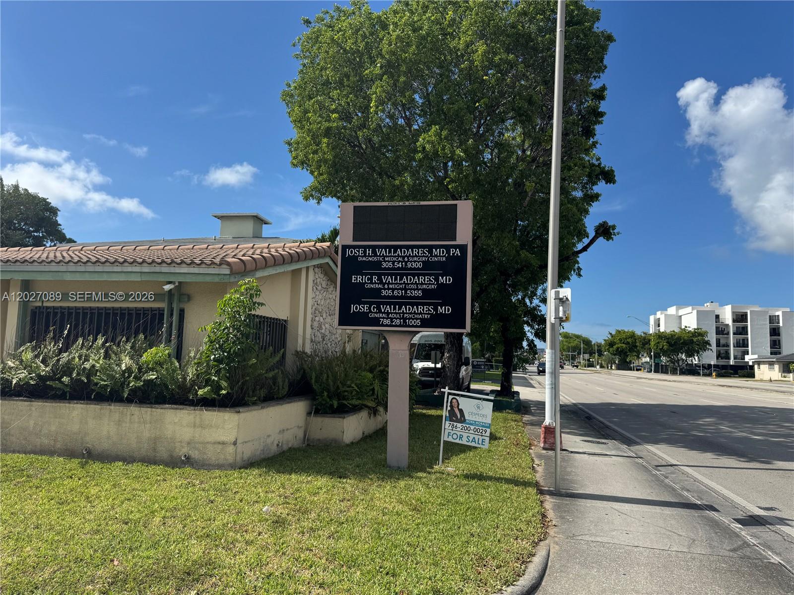 A medical office building with a prominent sign stands next to a road — 2660 SW 3rd St, Miami FL 33135, MIAMI, FL