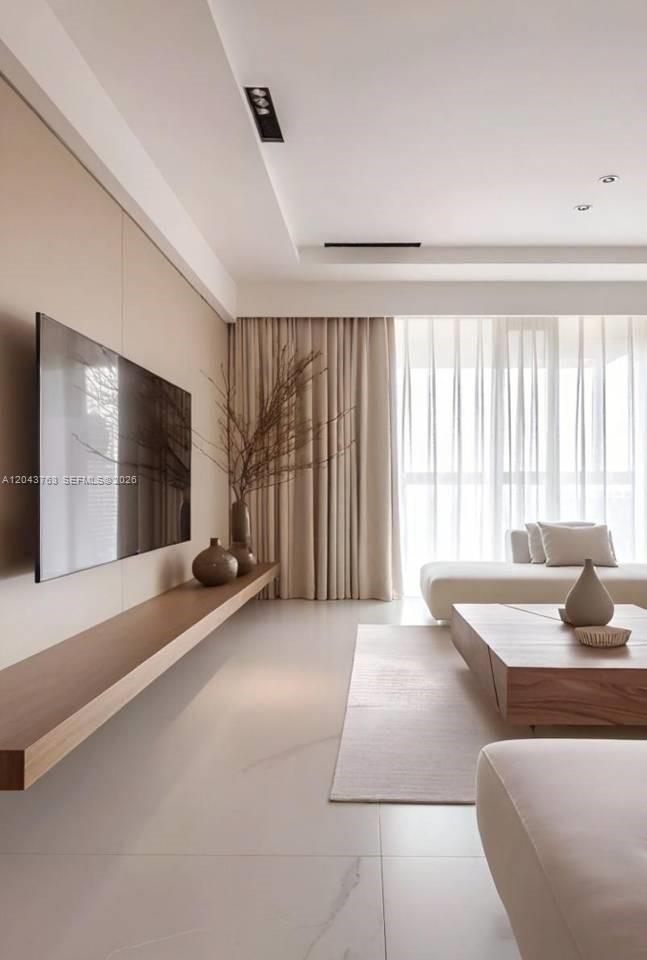 A modern living room features a floating wooden shelf, a wall-mounted television, and neutral decor — 0 villa aurora, FL, FL