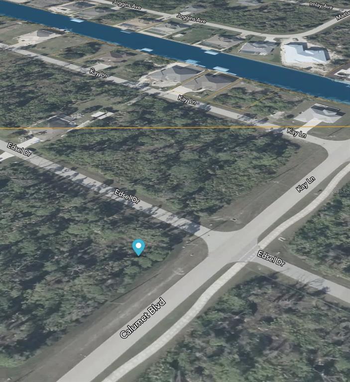 This is an aerial map view of a vacant, wooded corner lot — 14307 EDSEL DRIVE, PORT CHARLOTTE, FL