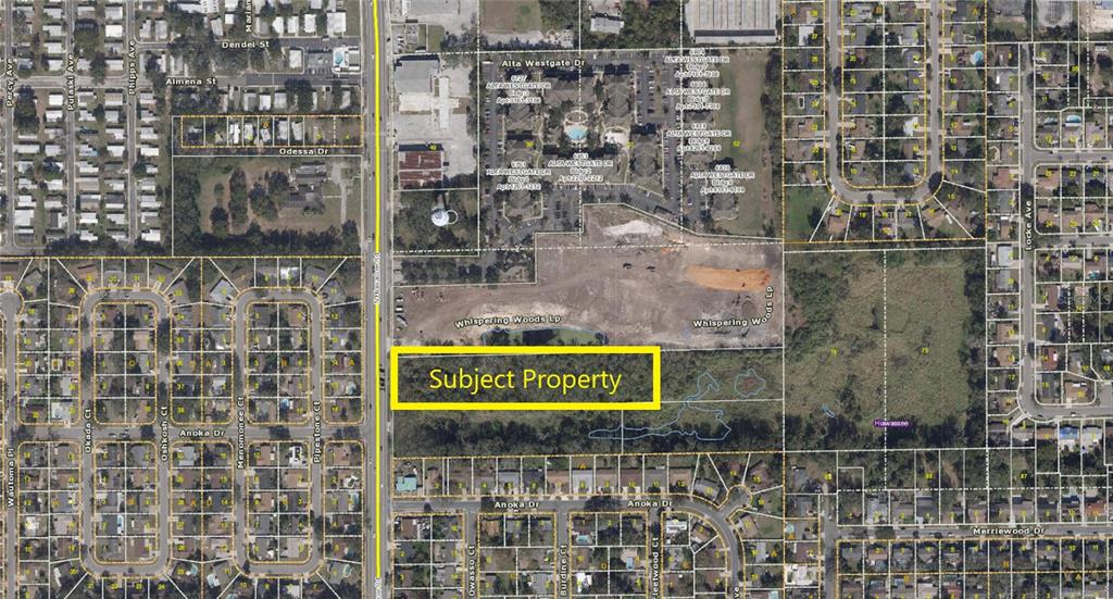 An aerial map view highlights a rectangular parcel of land as the subject property — N HIAWASSEE ROAD, ORLANDO, FL