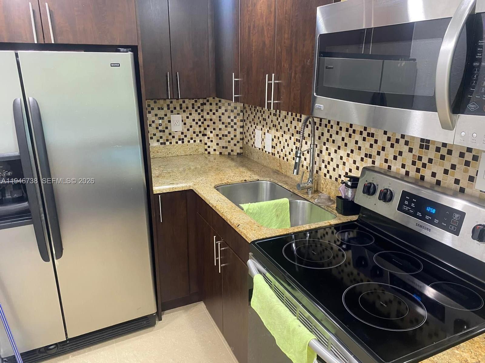 6950 Miami Gardens Dr # 402A, Hialeah FL 33015