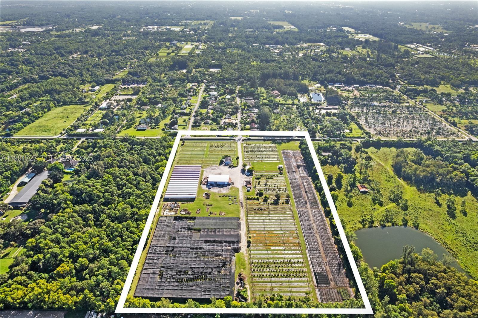 An aerial view shows a rectangular property featuring greenhouses, nursery rows, and a small building — 1535 B Road, FL 33470, FL