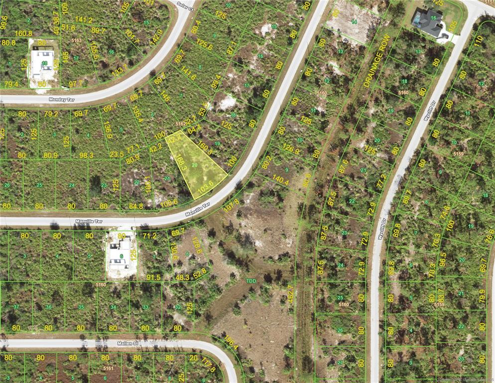 This is a map showing residential lots, streets, and undeveloped land in a subdivision — 7449 MANVILLE TERRACE, PORT CHARLOTTE, FL