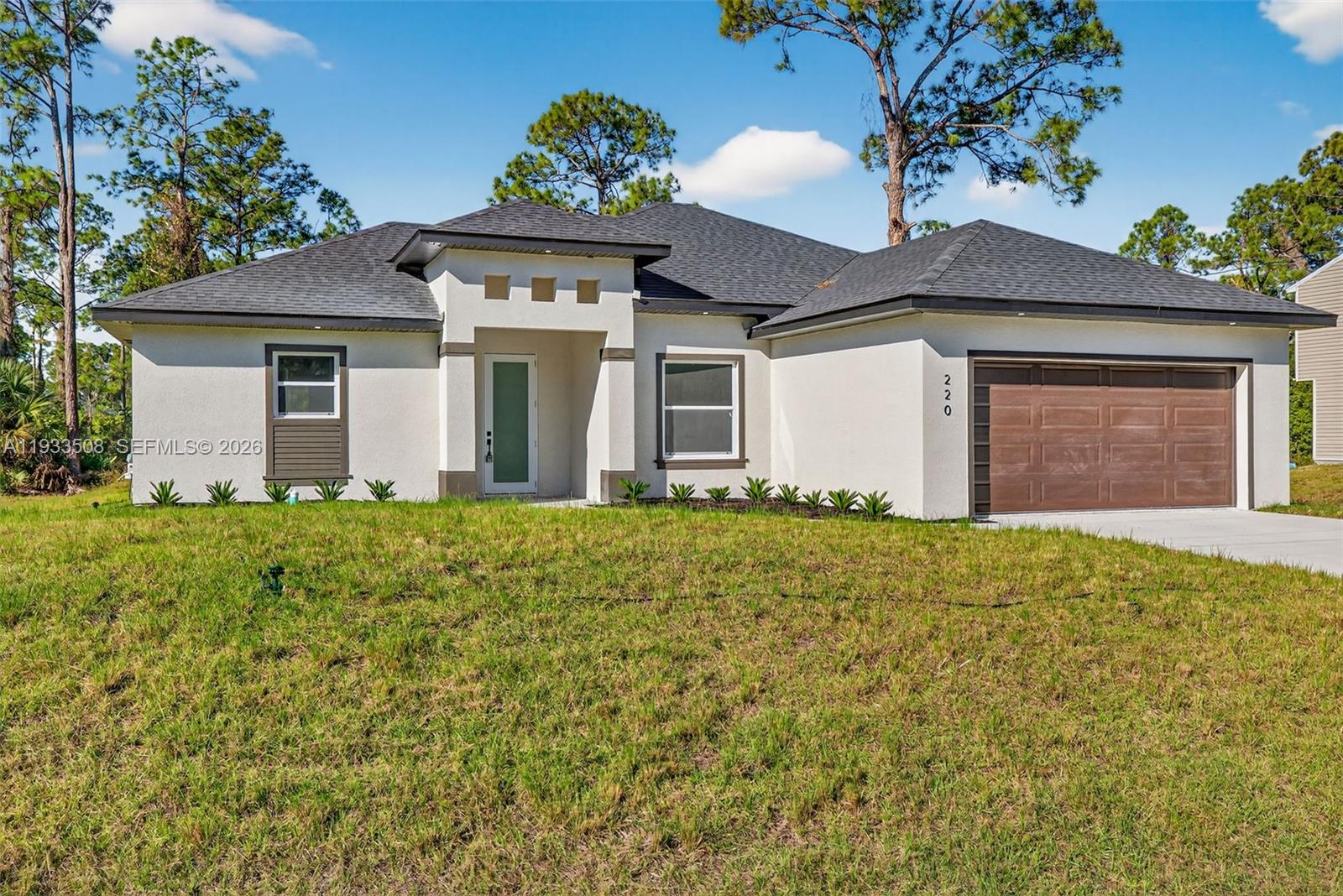 220 Lomax Ave, Lehigh Acres FL 33974