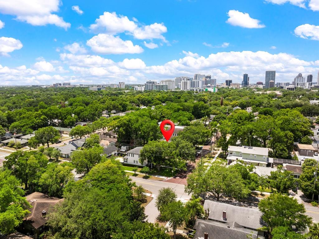 An aerial view shows a residential neighborhood with a red location pin over a house — 1518 E JEFFERSON STREET, ORLANDO, FL