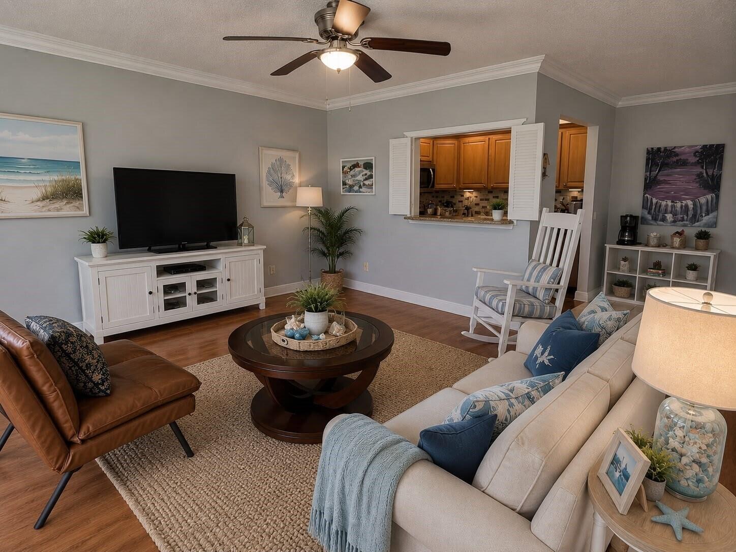 A living room features light gray walls, a ceiling fan, a white media console, and furniture — 261 Suffolk, Boca Raton FL 33434, BOCA RATON, FL