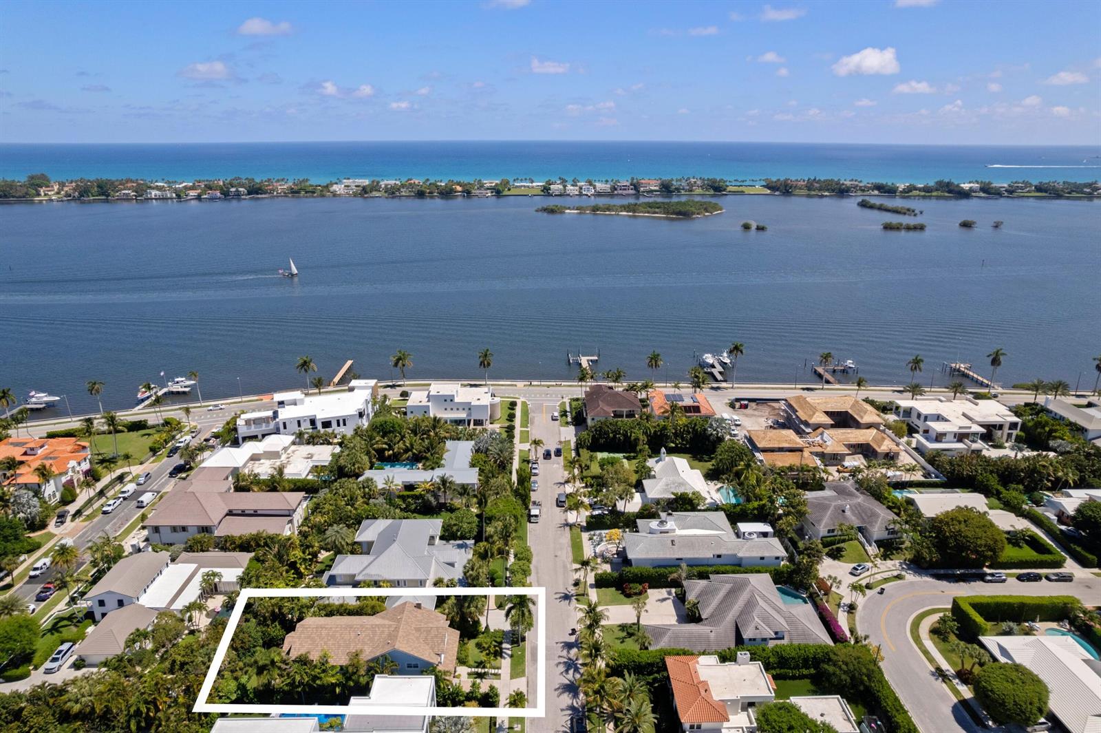 An aerial view shows a residential neighborhood with a highlighted house near the waterfront — 137 Cortez Road, West Palm Beach FL 33405, WEST PALM BEACH, FL