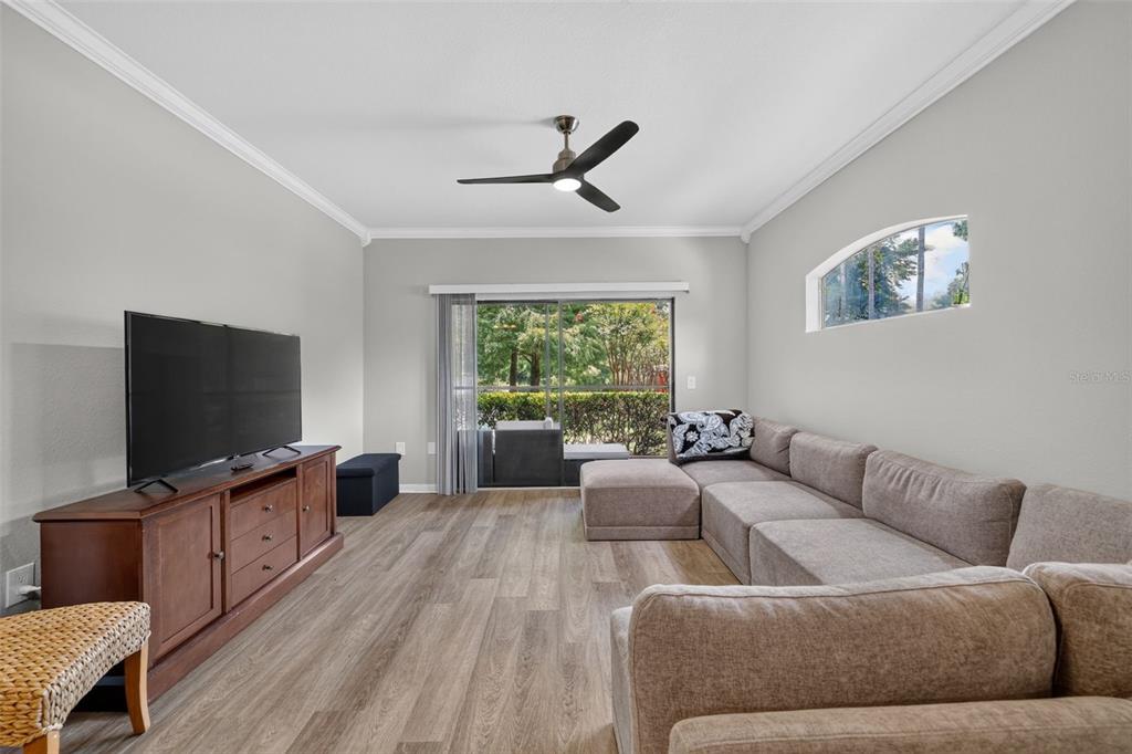 This is a two-story floor plan showing the layout of a residential unit — 2217 TUSCANY TRACE UNIT 7, PALM HARBOR, FL