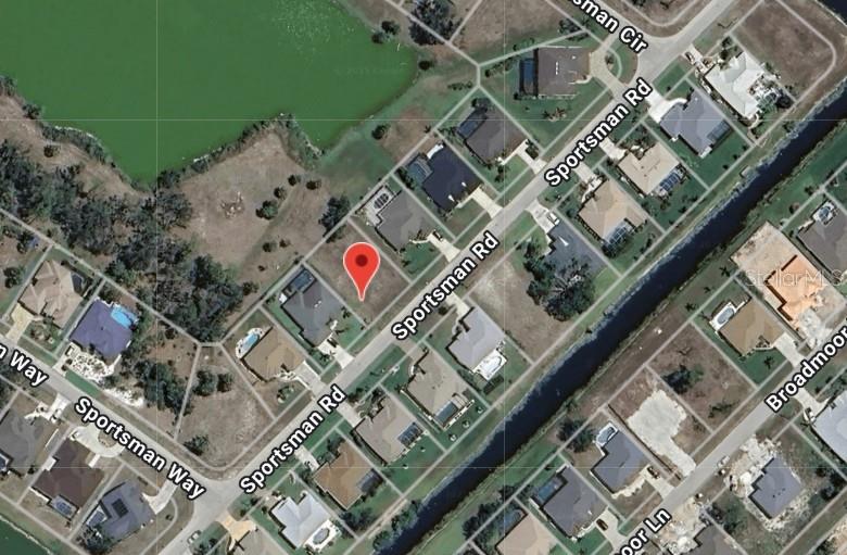 This is an aerial map view showing a vacant residential lot marked with a red pin — 196 SPORTSMAN ROAD, ROTONDA WEST, FL