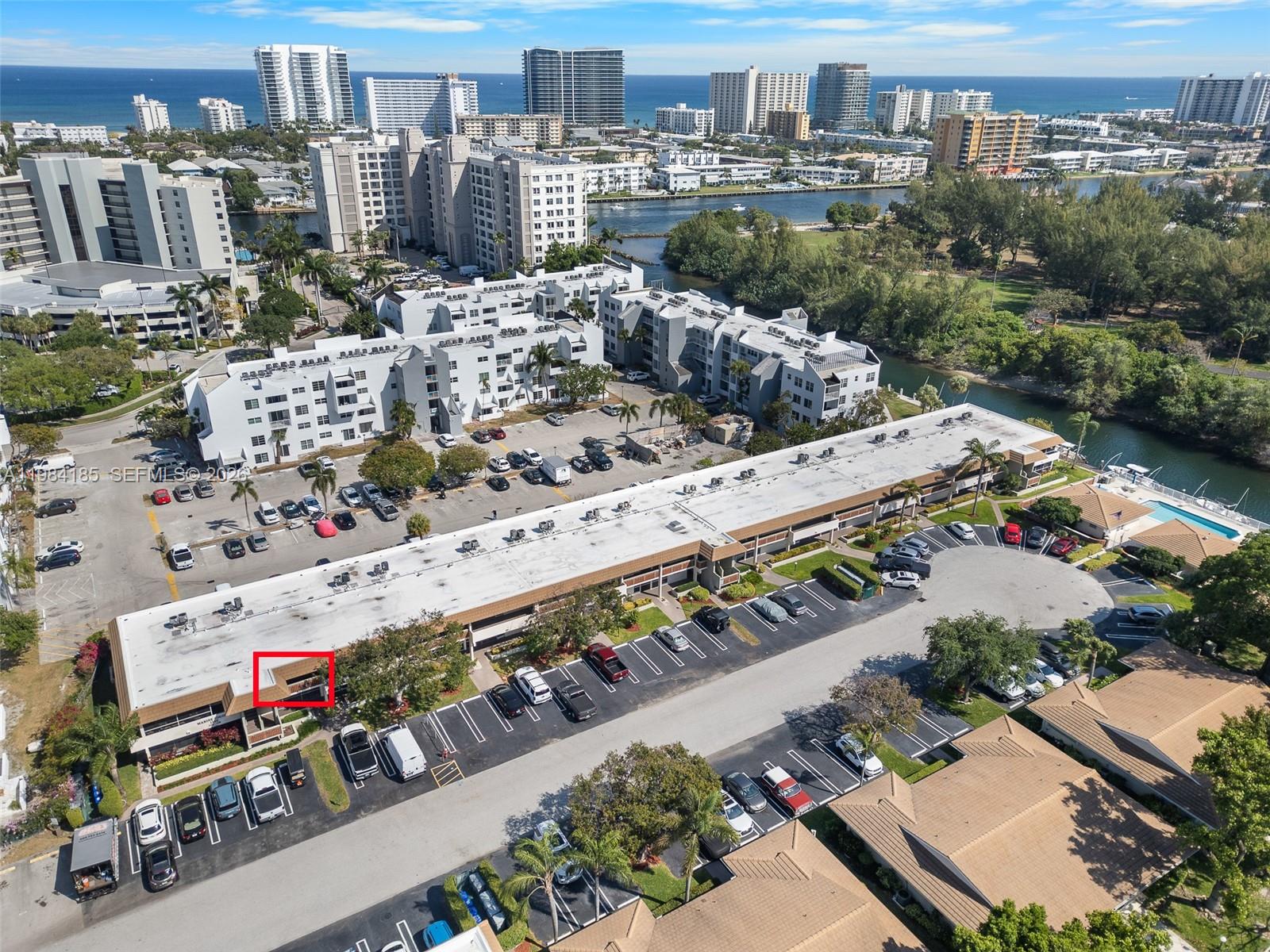 An aerial view shows a commercial building with a red box highlighting an entrance — 1340 NE 28th Ave # 244, Pompano Beach FL 33062, POMPANO BEACH, FL