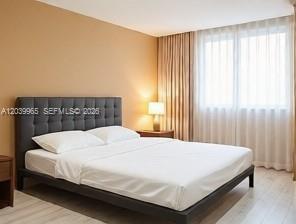 A bedroom features a dark tufted headboard, a white bed, and floor-to-ceiling curtains — 3930 S Roosevelt Blvd # 0, Key West FL 33040, KEY WEST, FL