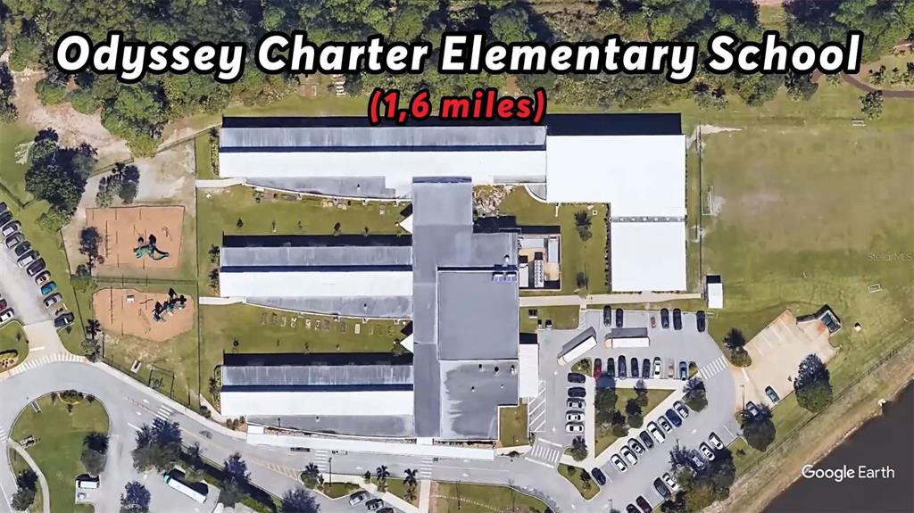 This aerial map view shows the Odyssey Charter Elementary School building, parking lot, and playground — 1059 LAVA STREET SE, PALM BAY, FL
