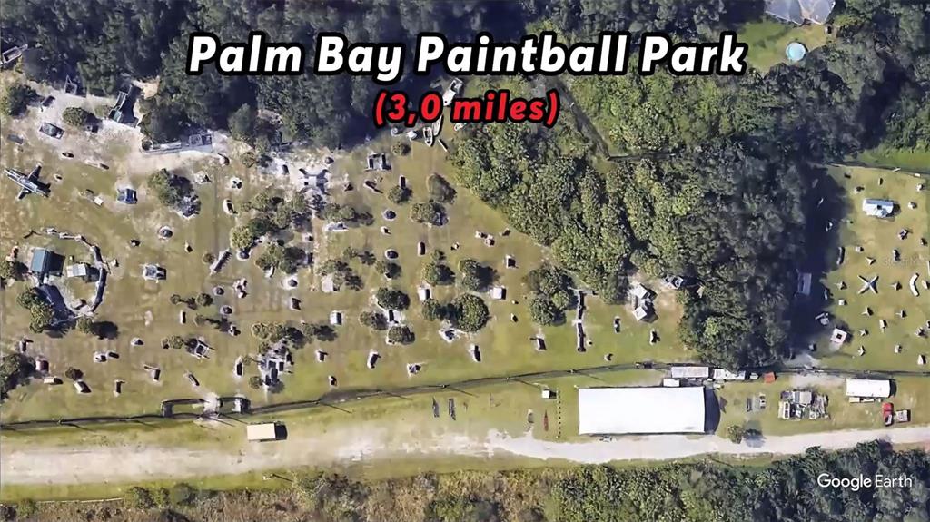 This aerial map view shows the Palm Bay Paintball Park with its various playing fields — 1059 LAVA STREET SE, PALM BAY, FL