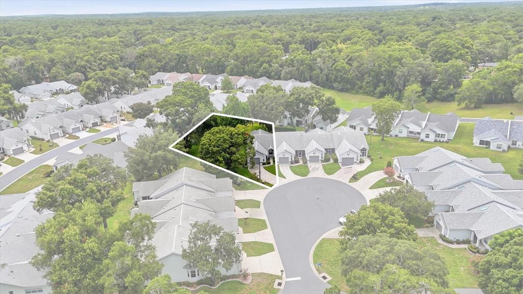 An aerial view shows a residential cul-de-sac with townhomes and a highlighted property lot — 6716 E WAYBRIDGE COURT, INVERNESS, FL