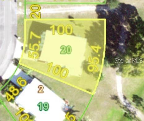 This is an aerial map showing the property boundaries and dimensions of a residential lot — 7578 RATAN CIRCLE, PORT CHARLOTTE, FL