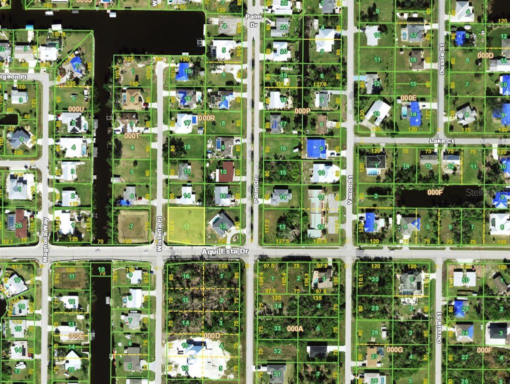 This is a satellite map showing residential lots and streets in a suburban neighborhood — 3130 WISTERIA PLACE, PUNTA GORDA, FL