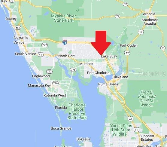 This is a map showing the location of Lake Suzy in Florida with a red arrow — LOT 26 JULIANNA STREET, NORTH PORT, FL