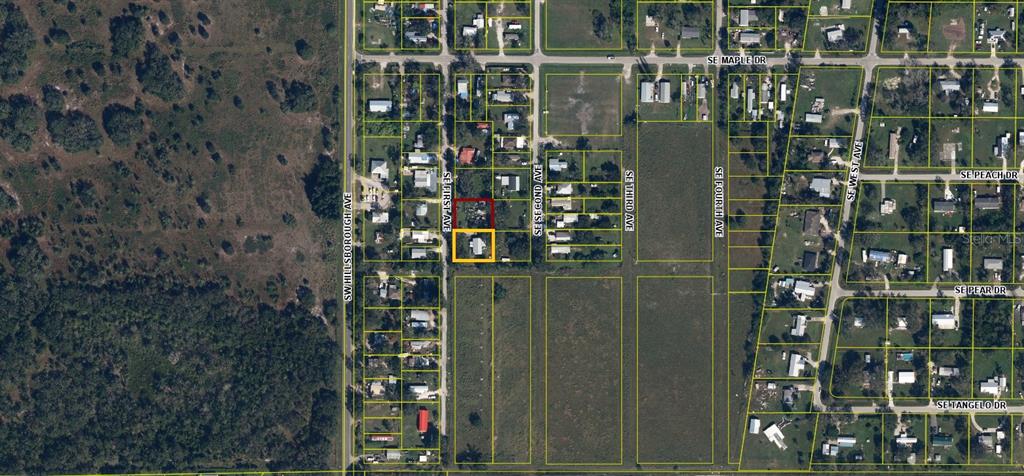 This is an aerial map showing a residential property highlighted in yellow and red — Lot 15-16 SE 1ST AVENUE, ARCADIA, FL