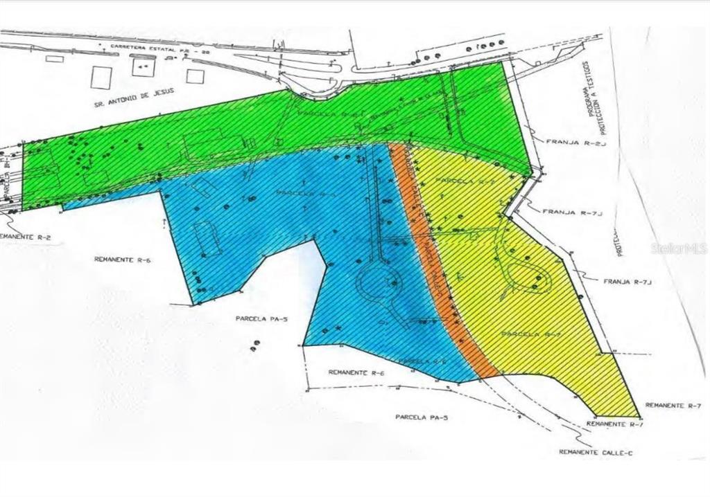 This is a land survey map showing various parcels of property with different color-coded sections — CARRETERA 2, KM 3.1, BAYAMON, PR
