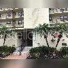 The exterior of a multi-story apartment building features a central entrance with palm trees — 800 COVE CAY DRIVE UNIT 5D, CLEARWATER, FL